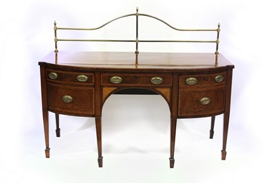 Lot 591 - A George III mahogany and inlaid bowfront...