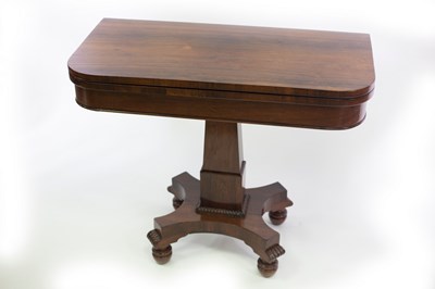 Lot 605 - A 19th Century fold-over card table on...