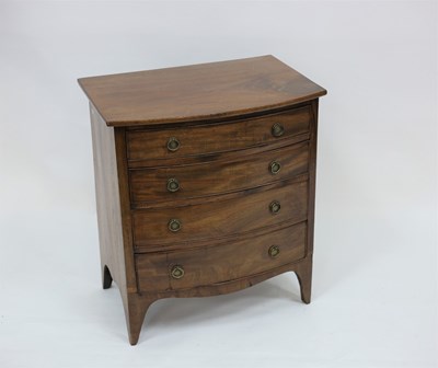 Lot 607 - A 19th Century mahogany bowfront chest of four...