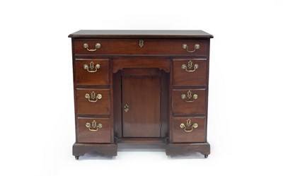 Lot 610 - A George III mahogany kneehole desk, 84cm wide