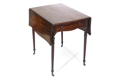 Lot 613 - A George III mahogany Pembroke table on fluted...