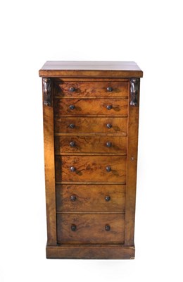 Lot 624 - A Victorian walnut Wellington chest of seven...