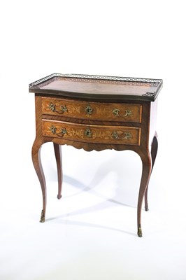 Lot 629 - A French walnut and inlaid serpentine front...