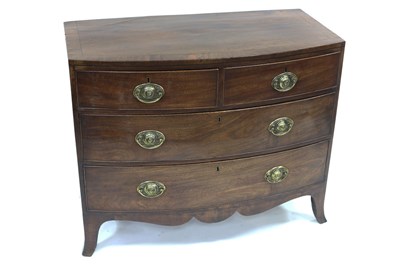 Lot 634 - A 19th Century bowfront chest of two short...