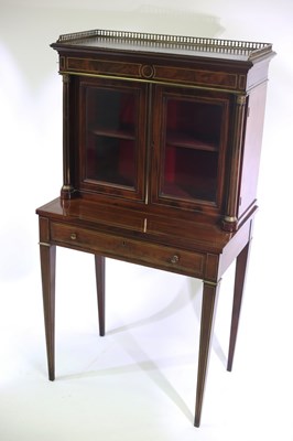 Lot 637 - A French mahogany and brass inlaid bonheur du...