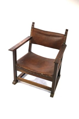 Lot 677 - A 19th Century low armchair with leather back...