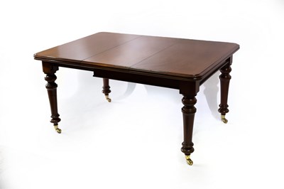 Lot 692 - A Victorian mahogany dining table with an...