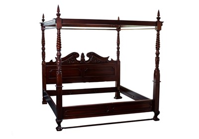 Lot 710 - A reproduction four poster bed with broken...