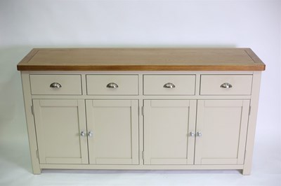 Lot 718 - A modern oak dresser base, the plain top above...