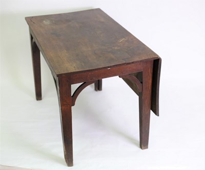 Lot 728 - A George III oak drop flap table, on square...