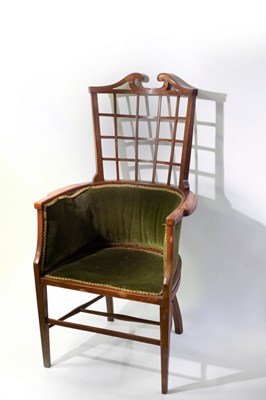 Lot 731 - An Aesthetic movement armchair with trellis...