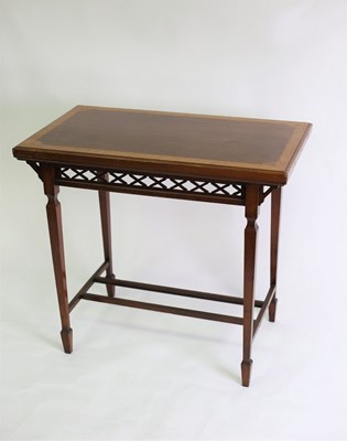 Lot 732 - An Edwardian satinwood crossbanded table with...