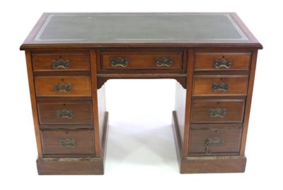 Lot 743 - An Edwardian pedestal desk, fitted nine...