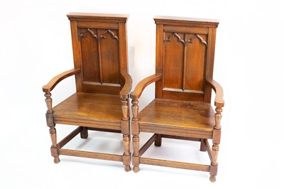 Lot 746 - A pair of Gothic style oak armchairs with...