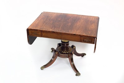 Lot 751 - A Regency rosewood and brass inlaid sofa table,...