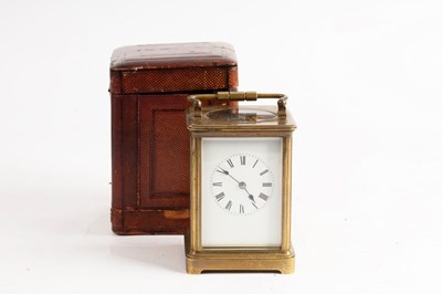 Lot 782 - A gilt brass cased carriage clock, the white...