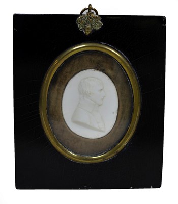 Lot 940 - An oval cameo portrait of Nelson in ebonised...