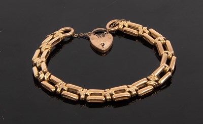 Lot 1 - A 9ct yellow gold bar link bracelet, with...