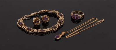 Lot 12 - A 9ct yellow gold and amethyst bracelet, set...