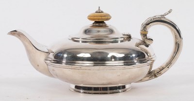 Lot 101 - A George IV silver teapot, Charles Thomas Fox,...