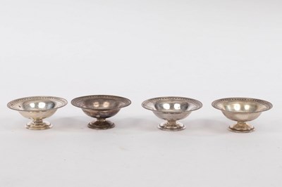 Lot 104 - A set of four Edwardian silver bonbon dishes,...