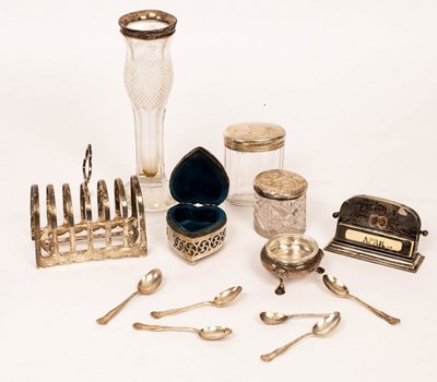 Lot 126 - A quantity of silver, including toast rack...