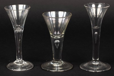 Lot 302 - Three 18th Century wine glasses of drawn...