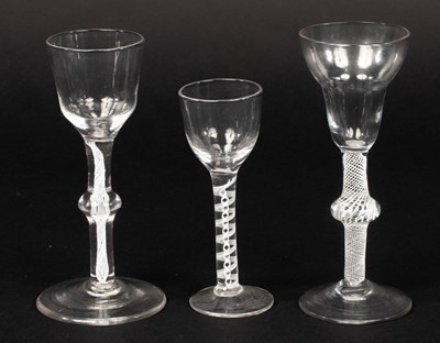 Lot 307 - Three 18th Century wine glasses of drawn...