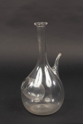 Lot 315 - An English glass ice pocket decanter, the...