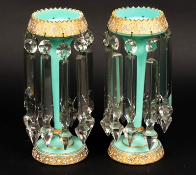 Lot 329 - A pair of turquoise and gilt glass table...