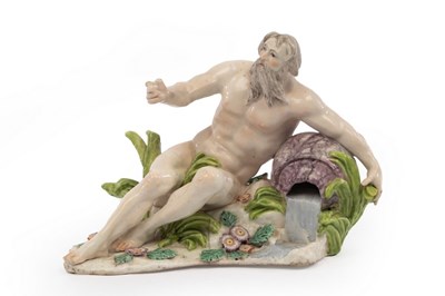 Lot 347 - A Chelsea figure of a river God reclining on a...