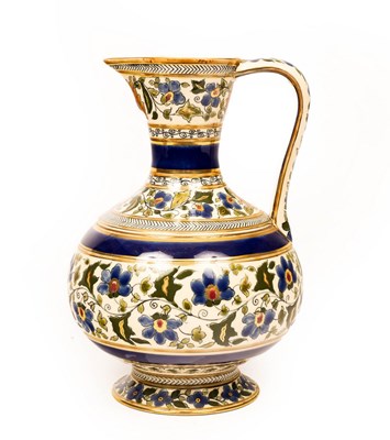 Lot 376 - A Zsolnay Pecs ewer decorated scrolling...