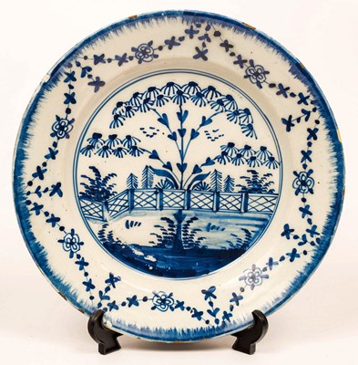 Lot 388 - A Liverpool Delftware plate, circa 1760,...