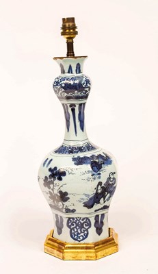 Lot 389 - An 18th Century Delft octagonal bottle vase...