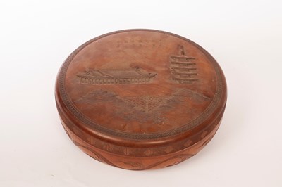 Lot 412 - A Japanese carved hardwood circular box,...