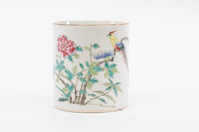 Lot 413 - A Chinese tankard painted an exotic bird in...