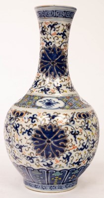 Lot 417 - A Chinese vase decorated in coloured enamels...