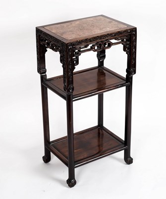 Lot 420 - A Chinese carved hardwood vase stand with...