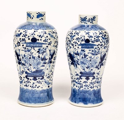 Lot 426 - A pair of 19th Century Chinese vases decorated...