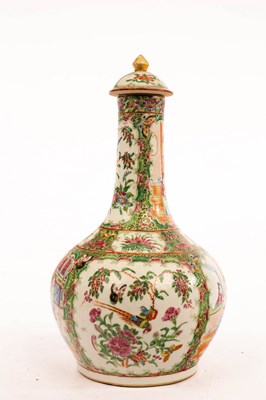 Lot 477 - A Cantonese famille rose bottle vase and cover,...