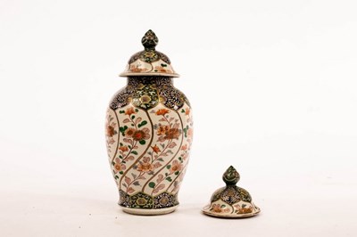 Lot 480 - A Chinese jar and cover and a matching cover,...