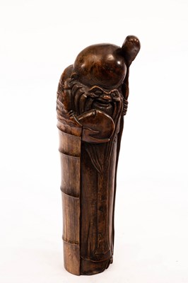 Lot 482 - A Chinese carved bamboo figure of Shoulao,...