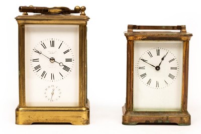 Lot 510 - A gilt brass cased carriage clock, the white...