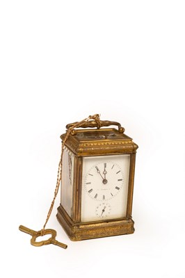 Lot 511 - A gilt brass cased carriage clock with repeat...