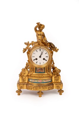 Lot 513 - A French gilt metal mounted mantel clock, the...