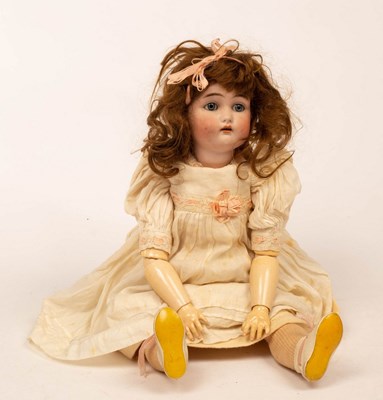 Lot 557 - A porcelain headed doll by Simon & Halbig, the...