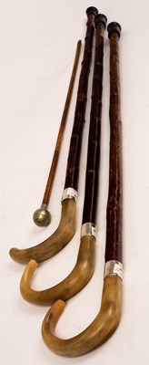 Lot 562 - Three walking sticks with horn handles and...