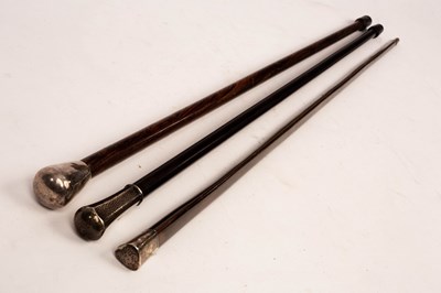 Lot 563 - An ebonised walking stick with German 925...