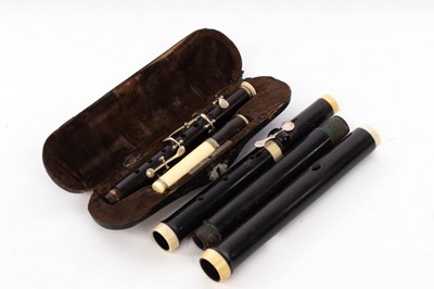 Lot 570 - An ebony flute by Gebr. Schott, Mainz, with...