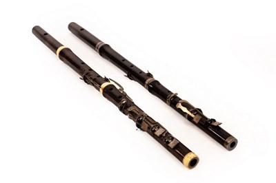 Lot 571 - A rosewood 8-key flute, Monzani & Co., with...